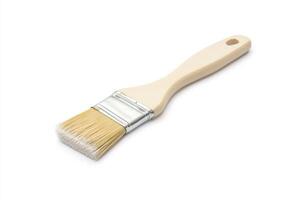 A white brush with a wooden handle on a white background photo