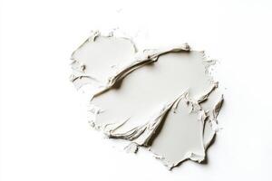 A piece of white paint on a white surface photo