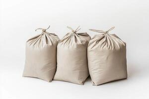 Cement bags arranged neatly on a white background showcasing texture and detail for construction and renovation projects photo