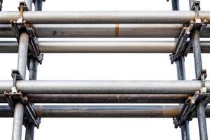 scaffolding pipes arranged neatly on white background showcasing industrial strength and versatility for construction photo
