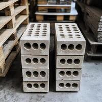 Unique air bricks showcased in a modern workshop setting with raw textures and industrial elements photo