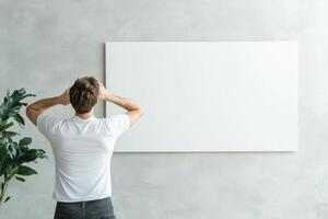 Struggling to find direction while facing an empty canvas in a quiet studio environment photo