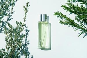 Elegant fragrance collection showcasing a delicate perfume bottle surrounded by aromatic greenery on a minimalist white backdrop photo