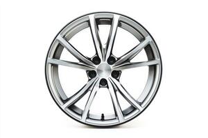 High quality car wheel rim isolated on a white background, perfect for automotive design projects photo
