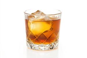 Fresh apple cider served in a crystal glass on white background with ice cubes photo