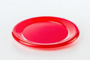 High quality red frisbee isolated on a clean white background with sharp details and realistic lighting photo