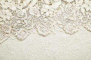 Intricate lace patterns on a soft background create a refined setting for creative designs photo