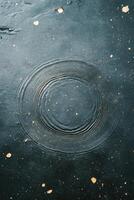 Celestial ripples create astrological imprints on a dark canvas resembling star maps photo