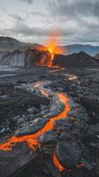Lava flowing into the ocean from a volcano photo