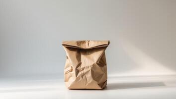 A brown paper bag sitting on a table photo