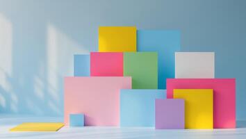 Overlapping colorful geometrical square objects on a light blue background. photo