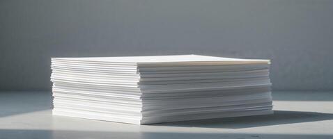 Stack of white paper on a table photo