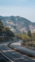 A highway with mountains in the background photo