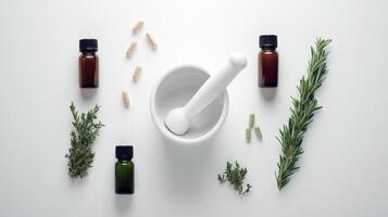 Herbal apothecary mortar, capsules, essential oils, rosemary, thyme photo