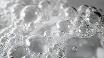 Close-up of glimmering soap bubbles in soft focus photo