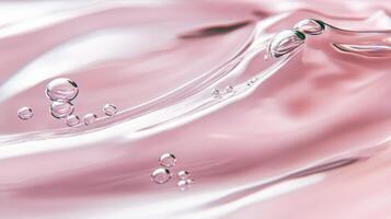 Close-up of pink liquid with air bubbles creating a serene wave effect photo