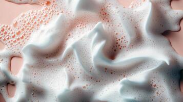 Close-up of pink and white foamy texture with bubbles photo