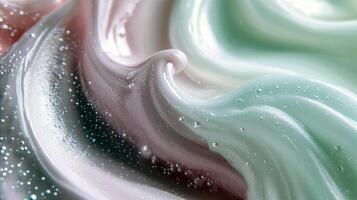 Swirling pink and white paint with bubbles and glossy texture photo