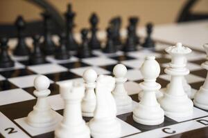 Chess pawns on the chessboard. photo