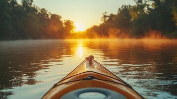 Kayak on the water at sunset photo