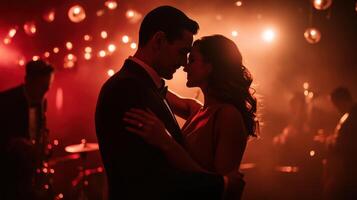 A couple shares an intimate dance under soft, romantic lights, creating a warm, enchanting atmosphere filled with love and connection. photo