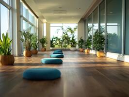Modern Yoga Studio with Large Windows, Wooden Floors, and Green Plants in a Bright and Serene Environment photo