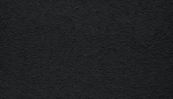 Textured Black Wall Surface with Unique Patterns for Creative Design Projects photo