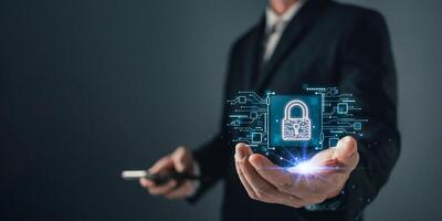 Cyber security and privacy protection network security computer and safe data concept. Businessmen protect personal data information from viruses on hand with virtual screen interfaces. photo