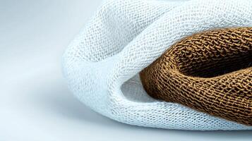 Close-up of intricately woven fabric showcasing texture and color contrast in soft lighting photo