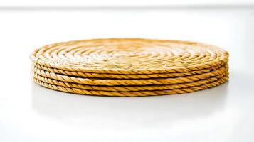 Close-up of woven coasters stacked neatly on a white surface, highlighting their texture and design photo