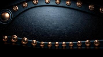 Close-up view of a metallic surface with rivets and a textured background, showcasing industrial design photo