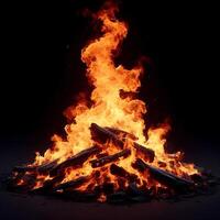 Blazing Bonfire with Burning Logs Against Dark Background photo