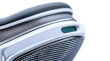 Close-up of a sleek, modern device showcasing intricate design and textures with a minimalist background photo