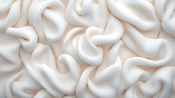 Abstract close-up of soft, white fabric folds creating a smooth, textured surface photo