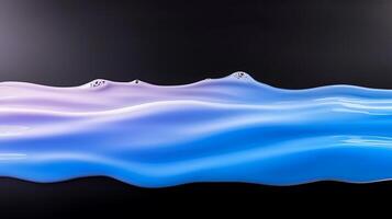 Fluid waves of blue and purple paint blend seamlessly on a dark background, creating an abstract art piece photo