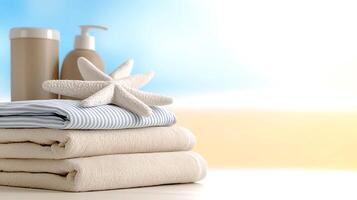 Soft towels and starfish arranged on a table with a beach background, evoking relaxation photo