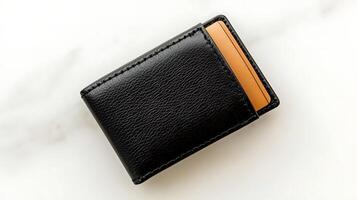 Sleek black wallet with a card peeking out, resting on a smooth marble surface, ideal for lifestyle shots photo