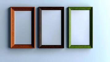 Three empty picture frames in varying colors hung on a light blue wall, creating a minimalist aesthetic photo