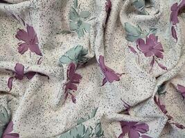 Seamless floral fabric pattern motif and background with summer and autumn flowers photo