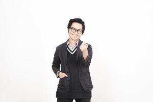 A man in glasses and a sweater is pointing at something photo
