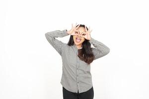 A woman making a face with her hands photo