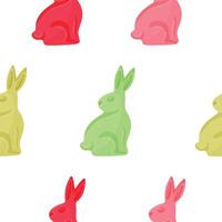 Seamless Easter pattern with colorful jelly rabbits with their heads turned to the left, for various Easter decorations vector