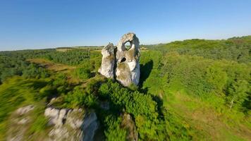 FPV flight through a hole in the limestone rock in Jurassic highlands, Poland video