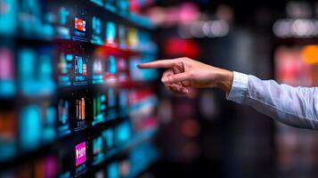 Person interacting with a digital display showcasing various products in a modern setting photo