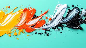 Vibrant abstract paint strokes in bold colors on a turquoise background, showcasing artistic expression photo