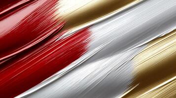 Abstract close-up of vibrant red, white, and gold paint strokes creating a dynamic texture photo