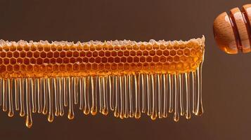 Close-up of honeycomb dripping with honey, showcasing texture and natural sweetness in a warm setting photo