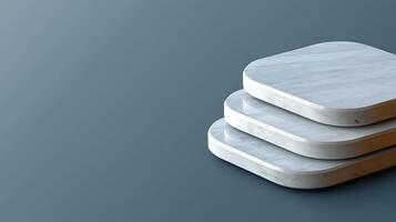 Stacked marble coasters on a smooth gradient background, showcasing modern design aesthetics photo