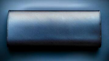 A sleek, modern wallet resting on a textured surface, showcasing its design and color photo