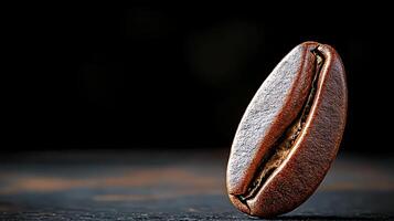 Close-up of a single coffee bean against a dark background, highlighting its texture and details photo